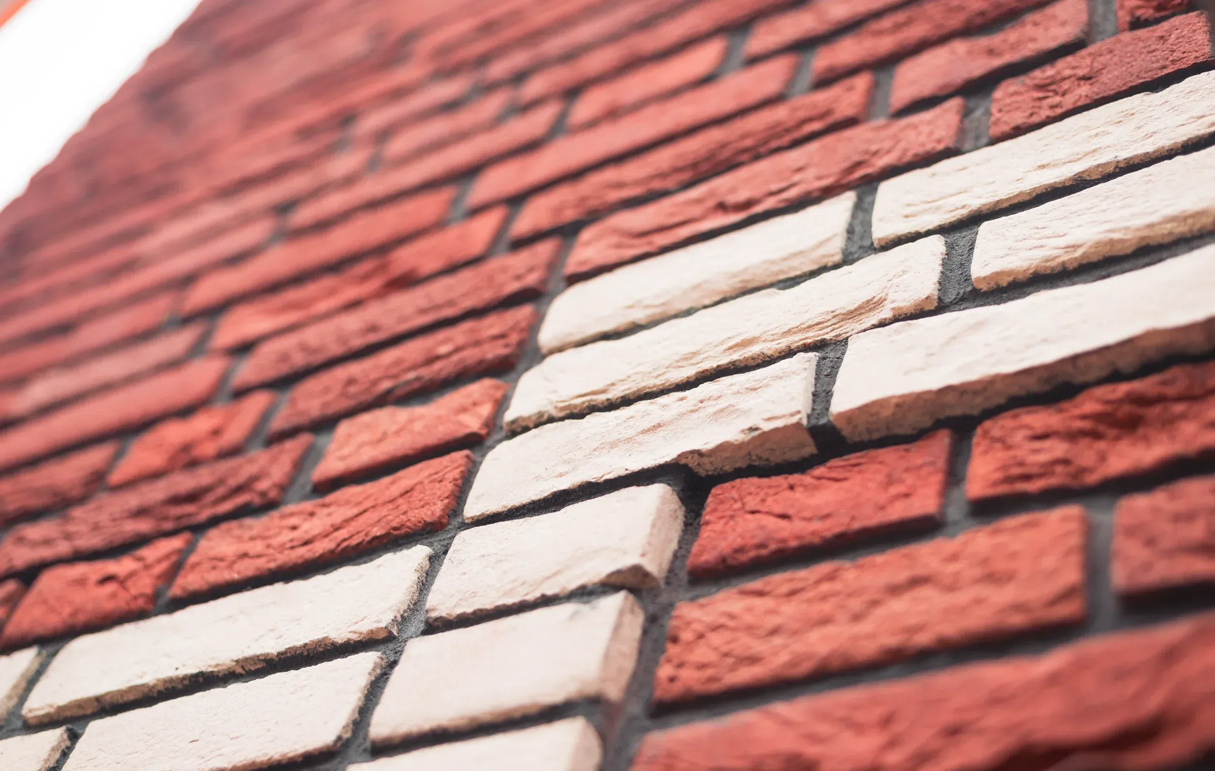 Structural detail of construction materials and framework against muted sky
